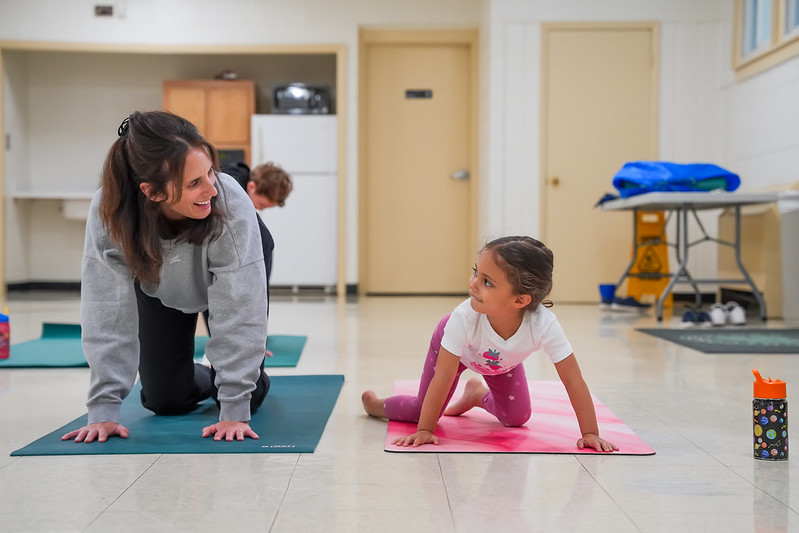 Mom and Toddler do yoga