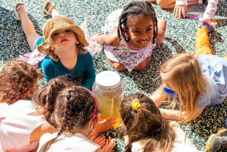 Children Looking at Tadpoles Maydale