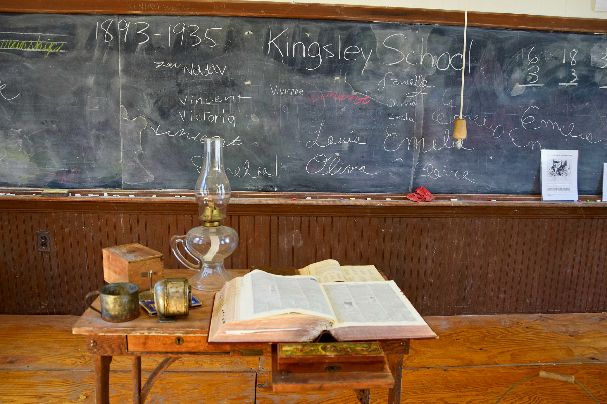 Kingsley Schoolhouse Blackboard and books -FAcebook