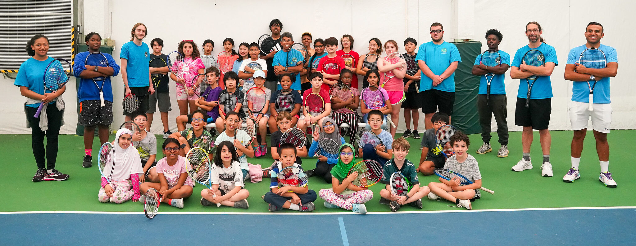 A tennis summer camp group photo